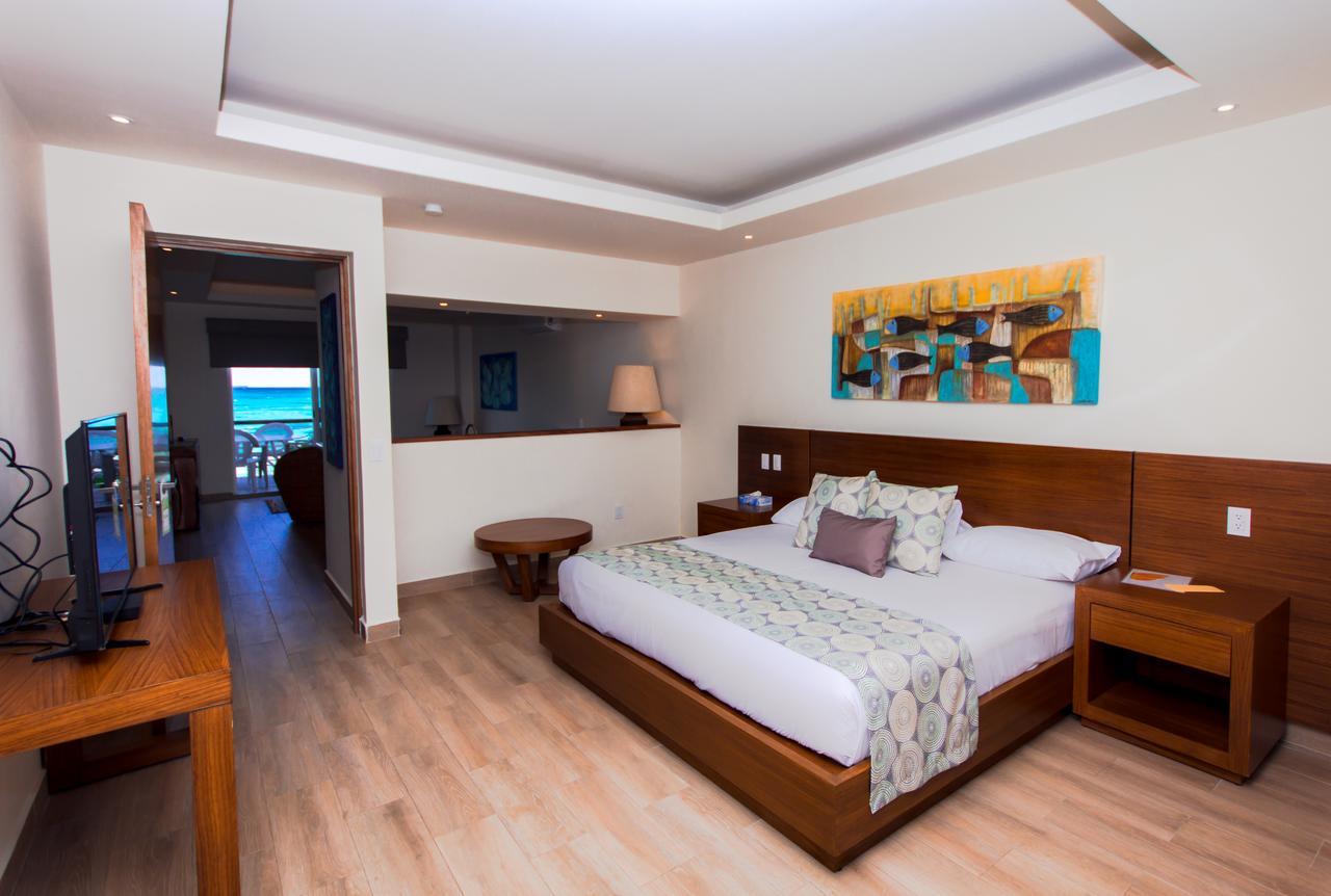 Suite Principal com Cama King-size e Vista Mar